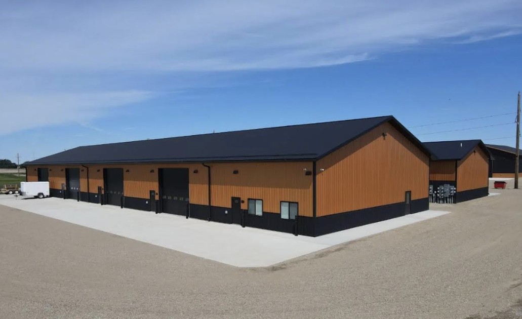 Row of Copper Creek shop condo units with concrete approach in Rugby, North Dakota