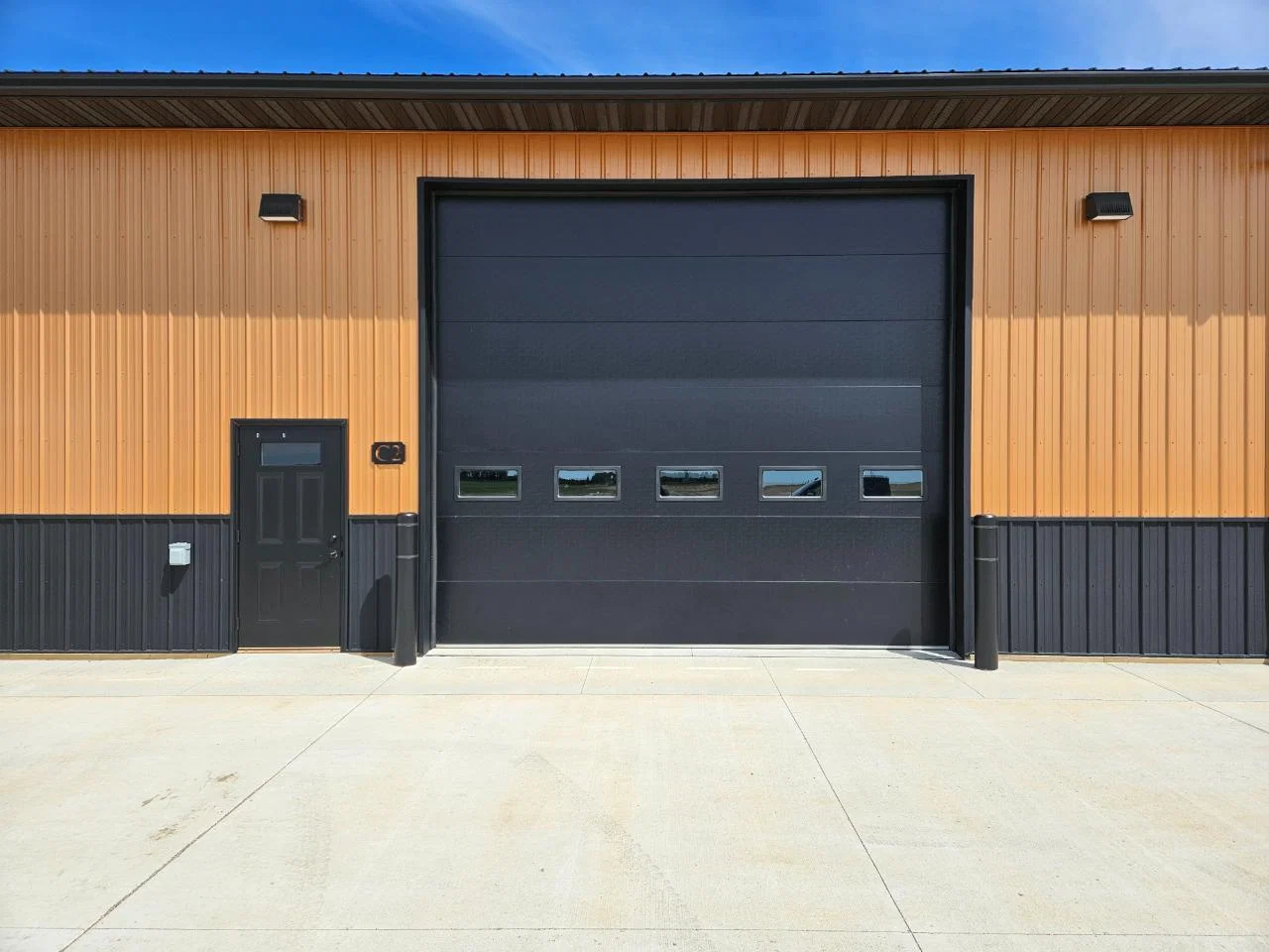 Unit C2 with a 16-foot insulated overhead door and private entry door