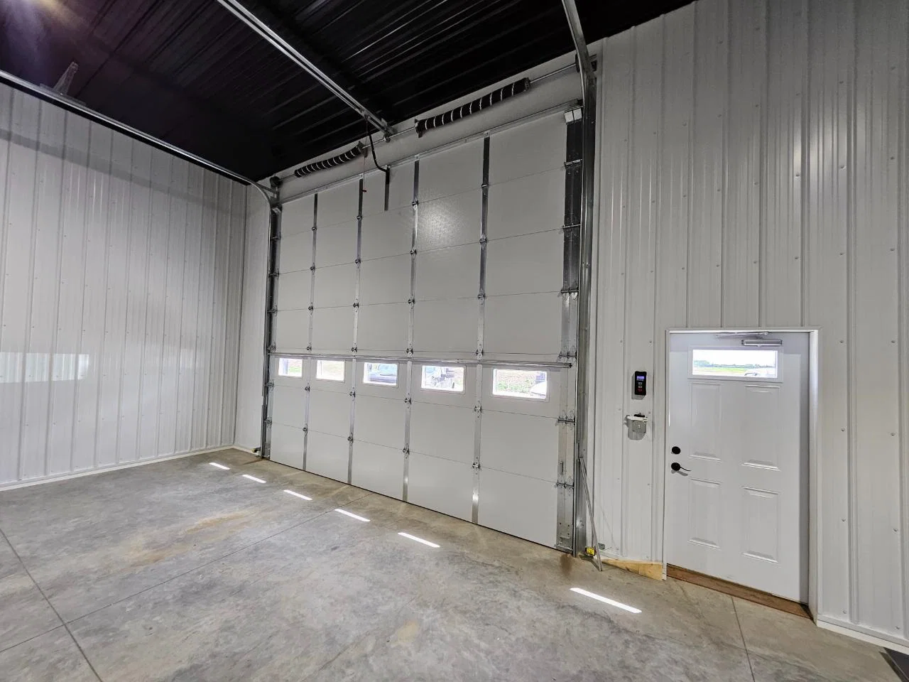 Unit C1 — looking out the open overhead door from inside the unit